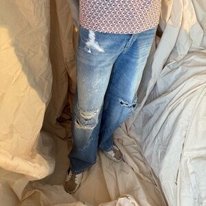 Distressed Men’s Blue Jeans